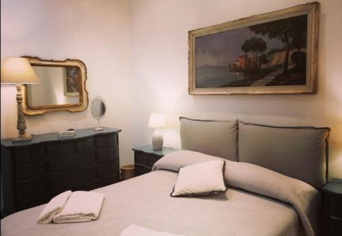 Un ou plusieurs lits dans un hébergement de l'établissement Borgo Pio 51 Apartment Vatican