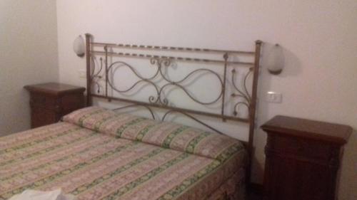 Ein Bett oder Betten in einem Zimmer der Unterkunft Le Tamerici