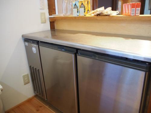 a kitchen with a counter top and a dishwasher at NORA in Numazu