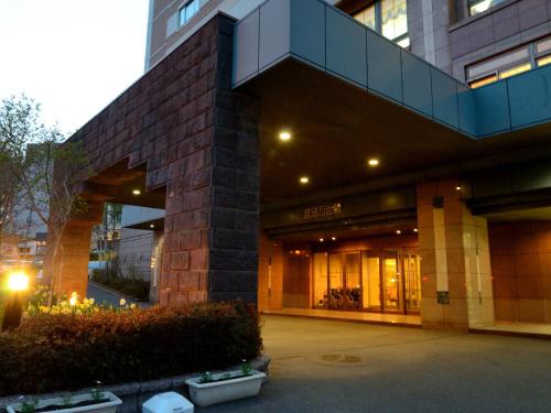 a large building with a lobby with at Noboribetsu Manseikaku in Noboribetsu