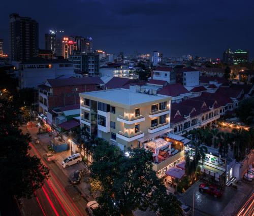 an aerial view of a city at night at Orussey One Boutique in Phnom Penh