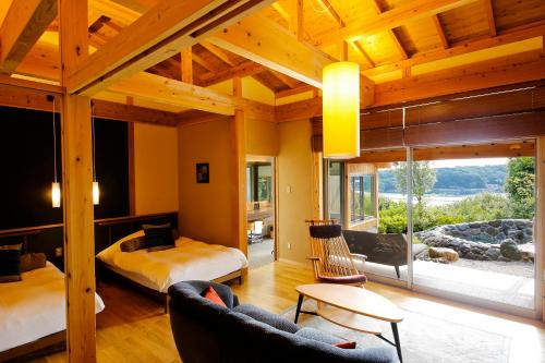 Ένα ή περισσότερα κρεβάτια σε δωμάτιο στο Teisho Basaratei