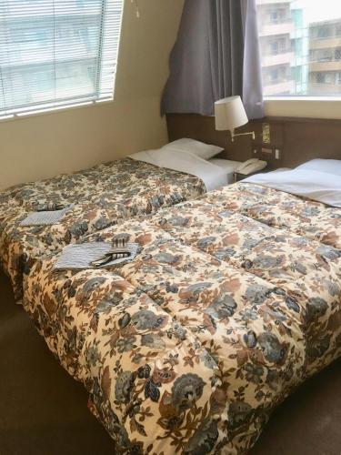Ένα ή περισσότερα κρεβάτια σε δωμάτιο στο Tabist Annex Hotel Tetora Hakodate