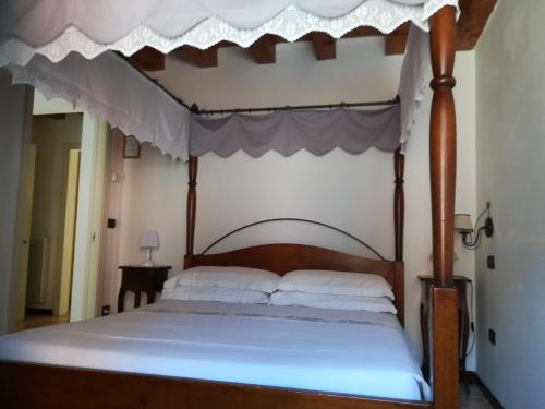 Posteľ alebo postele v izbe v ubytovaní Casa Genoveffa