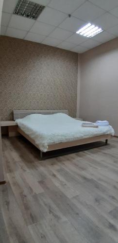 Ένα ή περισσότερα κρεβάτια σε δωμάτιο στο Apart 26