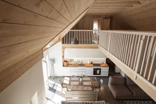 an overhead view of a living room with a staircase at Villa Bumba in Liigalaskma