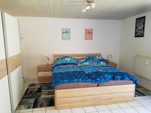 Postel nebo postele na pokoji v ubytování Ferienwohnung Mendig - Wasserschöpp