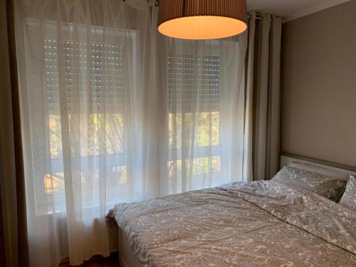 Кровать или кровати в номере Apartment Prestige 2