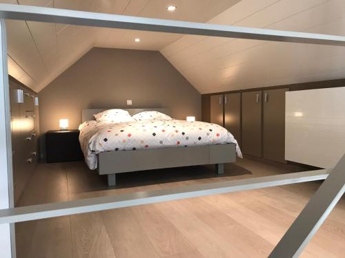 Кровать или кровати в номере Watou Guesthouse