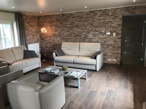 Гостиная зона в Watou Guesthouse