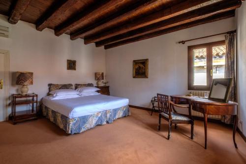 Postel nebo postele na pokoji v ubytování Ca' Affresco