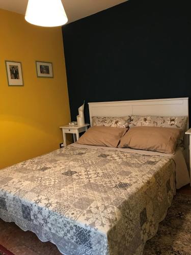 Ένα ή περισσότερα κρεβάτια σε δωμάτιο στο Noi Due Guest House - Relax in Monferrato