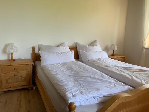 Ein Bett oder Betten in einem Zimmer der Unterkunft Urlaub im Weingarten