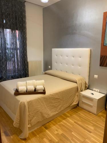 Un pat sau paturi într-o cameră la Cozy apartment Plaza del Pilar - San Felipe