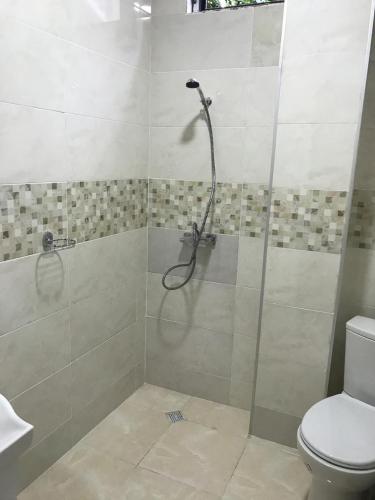 Un baño de Hotel Nino Ureki