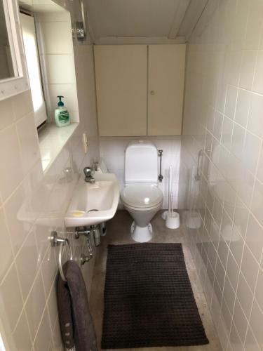 Ванная комната в Vissershuisjes ‘Duinendaele 65’