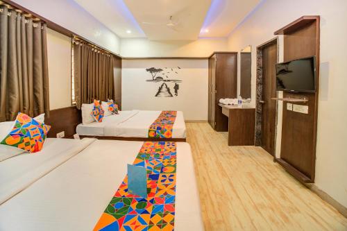FabHotel Bee Townにあるベッド