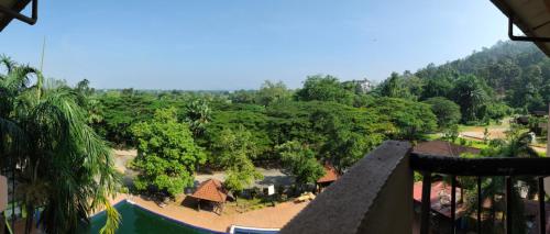 a view from the balcony of a resort with trees at Jana View Condotel MN in Kamunting