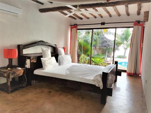 The Zanzibari tesisinde bir odada yatak veya yataklar