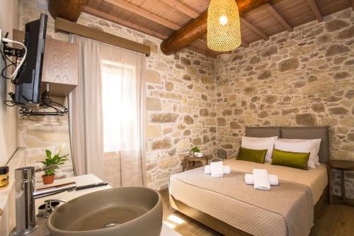 Ένα ή περισσότερα κρεβάτια σε δωμάτιο στο Kamartsos Villa 2