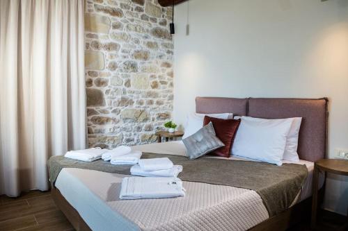 Ένα ή περισσότερα κρεβάτια σε δωμάτιο στο Kamartsos Villa 2