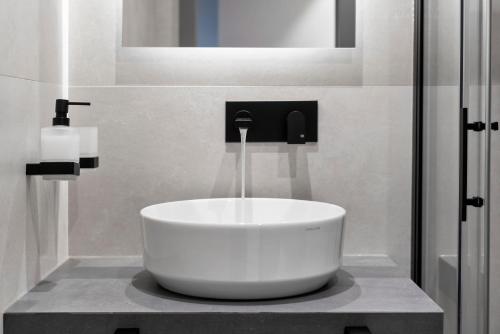 a bathroom with a large white bowl sink on a counter at FourRoomotel in Matulji