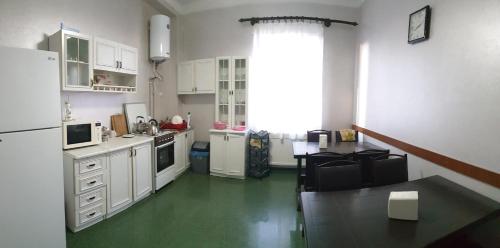 Кухня или мини-кухня в Guest House Sweet Home
