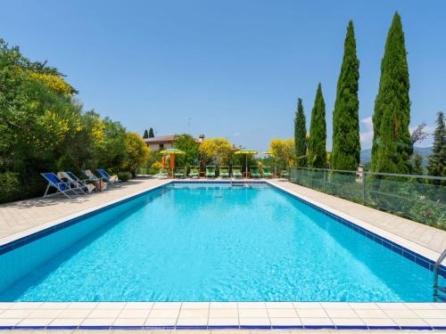 The swimming pool at or close to Villa La Rosa by Interhome