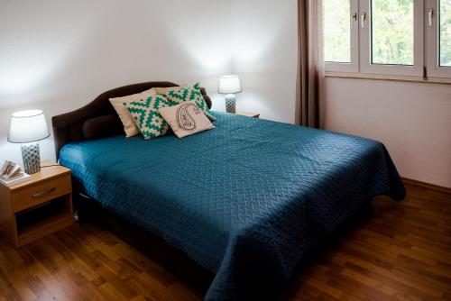 Voodi või voodid majutusasutuse Apartments Anra toas