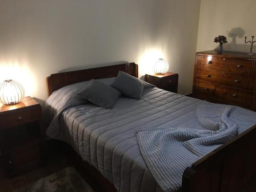 Tempat tidur dalam kamar di Casa do Largo