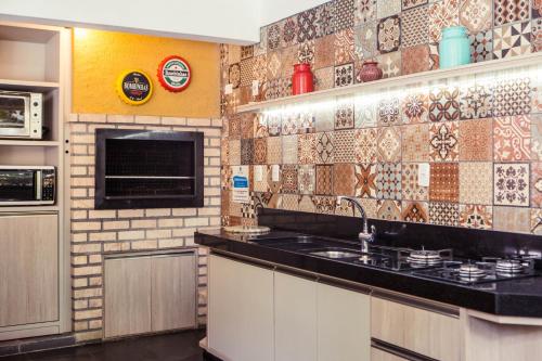 Dapur atau dapur kecil di Pousada Dom Capudi