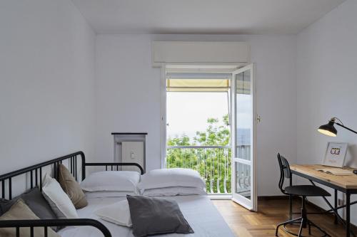 Ліжко або ліжка в номері Casa Bianca a Bogliasco by Wonderful Italy