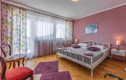 En eller flere senge i et værelse på Apartment 1