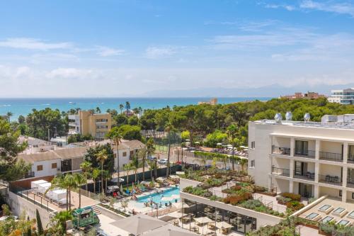 an aerial view of a city with a resort at Hotel Paradiso Garden in Playa de Palma