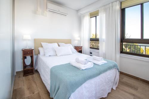 Posteľ alebo postele v izbe v ubytovaní Apartamento Albatro´s suite