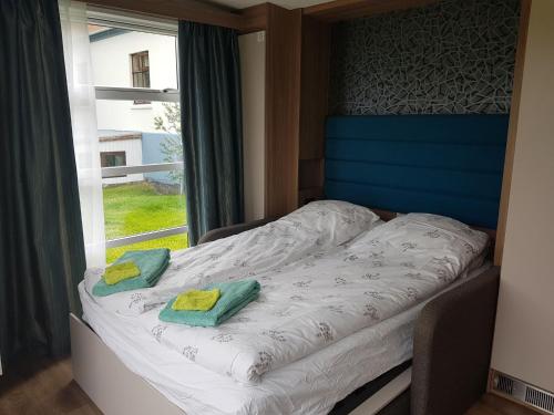 Ein Bett oder Betten in einem Zimmer der Unterkunft Hagi 1 Guesthouse