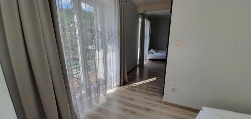 Postel nebo postele na pokoji v ubytování Apartamenty pod Czyrną