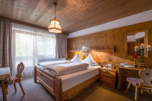 Postel nebo postele na pokoji v ubytování Gästehaus Rauch