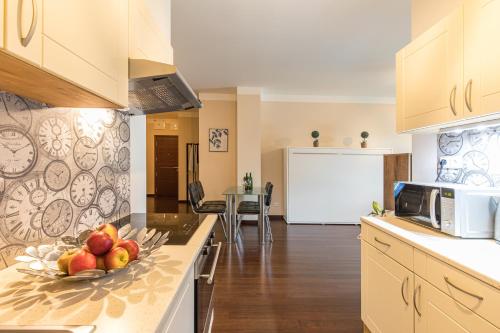 Кухня или мини-кухня в Rezidence Moser Apartments
