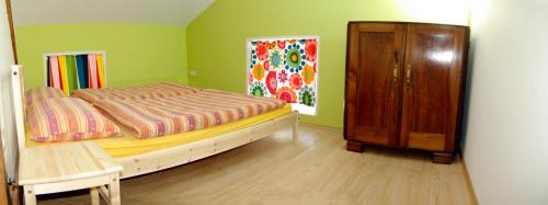 A bed or beds in a room at The Soča House Tolmin