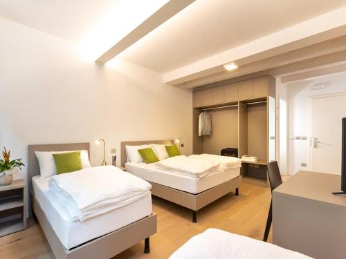Letto o letti in una camera di Locanda Le Due Travi
