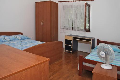 Кровать или кровати в номере Apartments Bakić