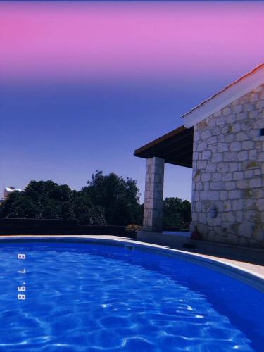 Πισίνα στο ή κοντά στο Afroditi House