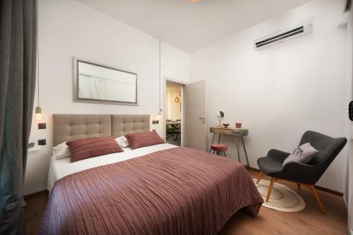 מיטה או מיטות בחדר ב-Apartment Altana with free parking