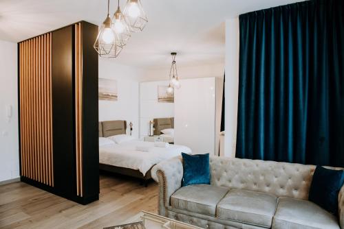 Llit o llits en una habitació de ZEN Central Apartments