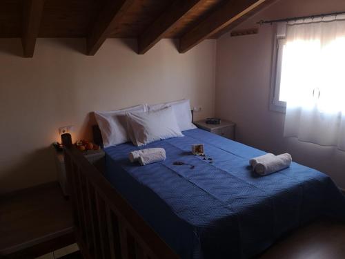 Кровать или кровати в номере Villa ARETOUSA - Cretan Hospitality