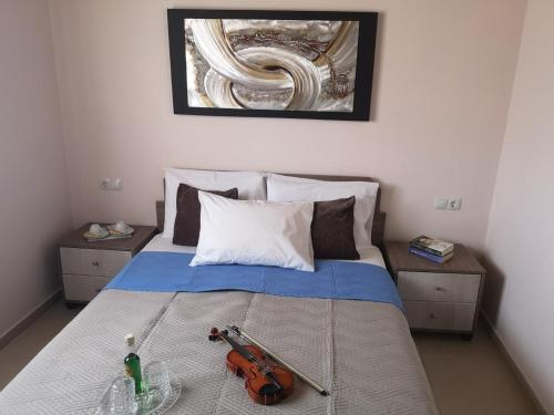 Кровать или кровати в номере Villa ARETOUSA - Cretan Hospitality