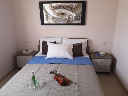 Кровать или кровати в номере Villa ARETOUSA - Cretan Hospitality