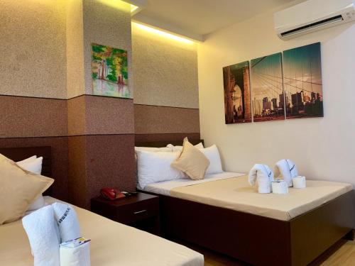 Davao Persimmon Suites 객실 침대