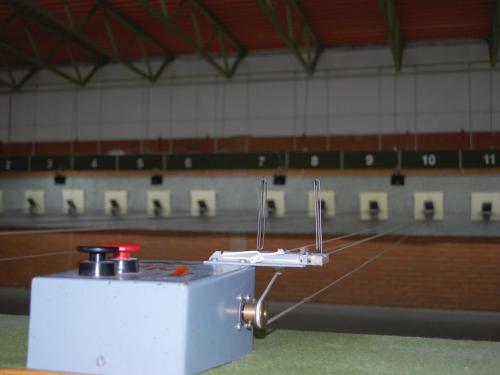 a white machine sitting in a room with a gym at Holiday Park CFK in Vrbas